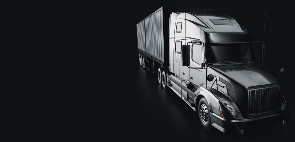how to start trucking business - silver truck dark background